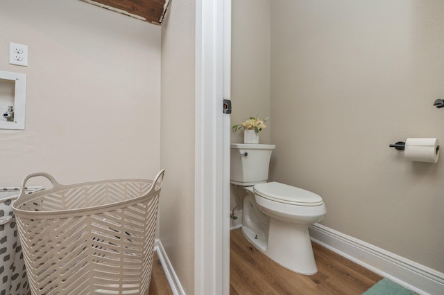 6060 Bud Moulton Rd, Crestview, FL 32536 - bathroom featuring wood finished floors and toilet