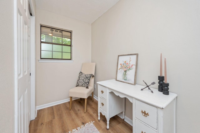 6060 Bud Moulton Rd, Crestview, FL 32536 - office area featuring light wood-style flooring and baseboards