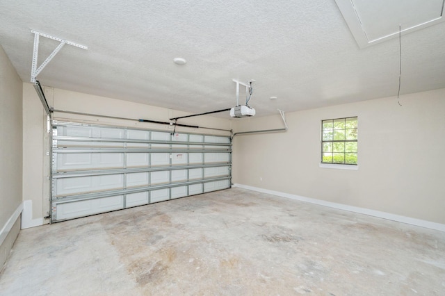 6060 Bud Moulton Rd, Crestview, FL 32536 - garage featuring a garage door opener and baseboards