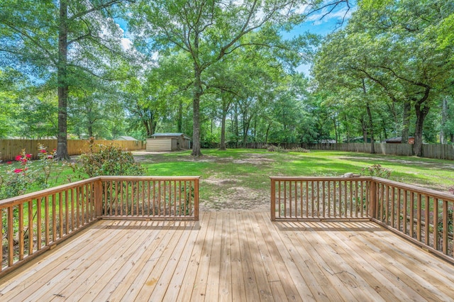 6060 Bud Moulton Rd, Crestview, FL 32536 - wooden deck with a shed, a fenced backyard, and view of wooded area