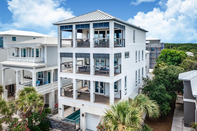 64 S Emerald Cove Ln, Inlet Beach, FL 32461 - view of property with an attached garage
