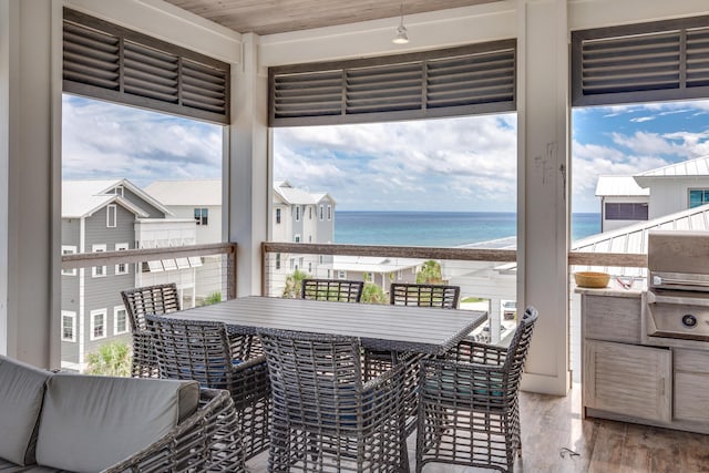 64 S Emerald Cove Ln, Inlet Beach, FL 32461 - sunroom with a water view