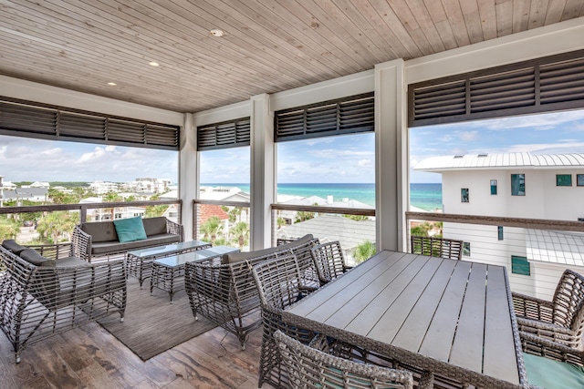 64 S Emerald Cove Ln, Inlet Beach, FL 32461 - wooden deck with an outdoor living space, a water view, and outdoor dining space