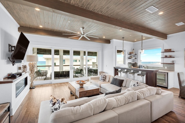 64 S Emerald Cove Ln, Inlet Beach, FL 32461 - living room with wine cooler, healthy amount of natural light, wood-type flooring, recessed lighting, and ceiling fan