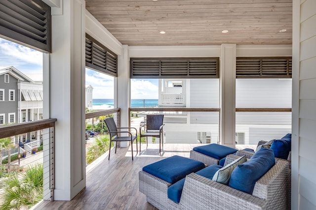 64 S Emerald Cove Ln, Inlet Beach, FL 32461 - sunroom / solarium featuring a water view