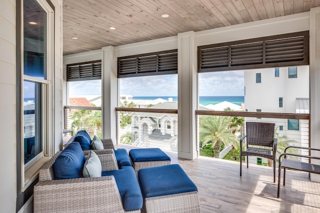 64 S Emerald Cove Ln, Inlet Beach, FL 32461 - sunroom featuring a water view
