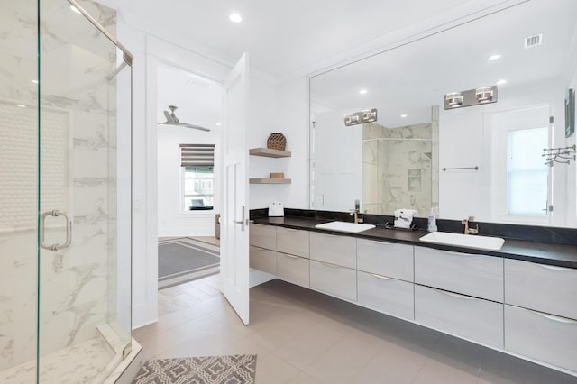 64 S Emerald Cove Ln, Inlet Beach, FL 32461 - bathroom featuring double vanity, a marble finish shower, and recessed lighting
