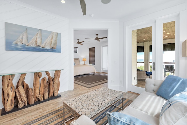 64 S Emerald Cove Ln, Inlet Beach, FL 32461 - living area featuring a ceiling fan, wood finished floors, and ornamental molding