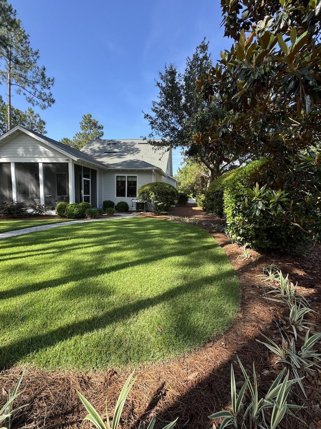 360 Jack Knife Dr, Inlet Beach, FL 32461 - view of green lawn featuring a sunroom