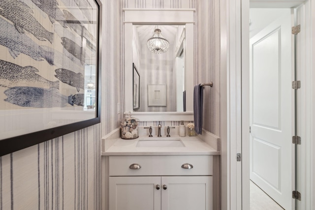 360 Jack Knife Dr, Inlet Beach, FL 32461 - bathroom featuring wallpapered walls, vanity, and a chandelier