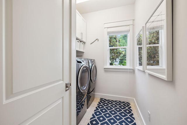 360 Jack Knife Dr, Inlet Beach, FL 32461 - washroom featuring cabinet space, washer and clothes dryer, and light tile patterned flooring