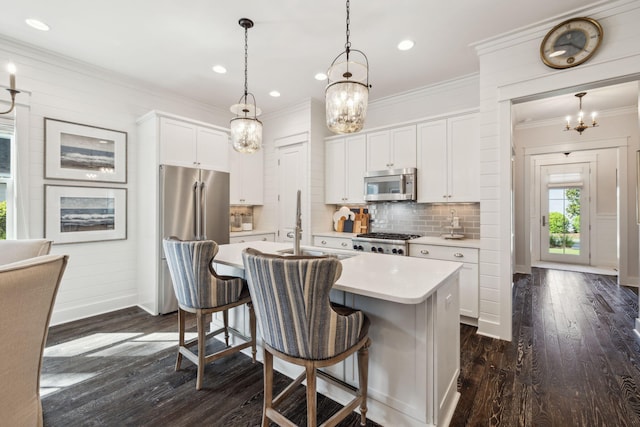 360 Jack Knife Dr, Inlet Beach, FL 32461 - kitchen featuring stainless steel appliances, a chandelier, light countertops, a kitchen island with sink, and tasteful backsplash