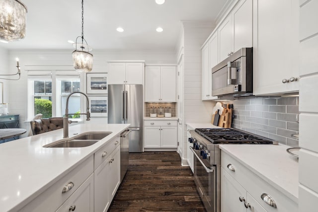 360 Jack Knife Dr, Inlet Beach, FL 32461 - kitchen featuring premium appliances, light countertops, dark wood-style floors, backsplash, and recessed lighting