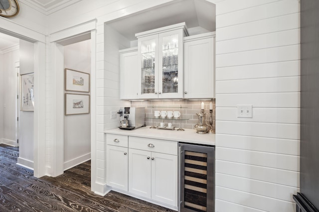 360 Jack Knife Dr, Inlet Beach, FL 32461 - indoor dry bar featuring beverage cooler, dark wood-type flooring, tasteful backsplash, and ornamental molding