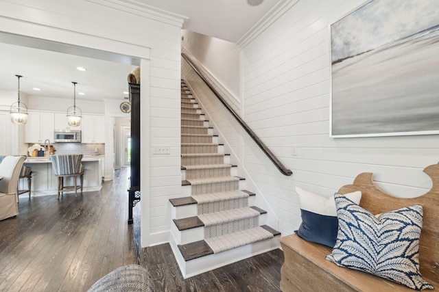 360 Jack Knife Dr, Inlet Beach, FL 32461 - stairway featuring hardwood / wood-style floors, wood walls, and recessed lighting