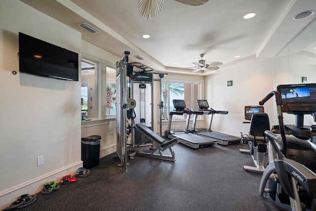 219 Scenic Gulf Dr Unit 930, Miramar Beach, FL 32550 - workout area featuring a ceiling fan, recessed lighting, and a raised ceiling