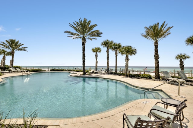 219 Scenic Gulf Dr Unit 930, Miramar Beach, FL 32550 - community pool with a patio and a water view