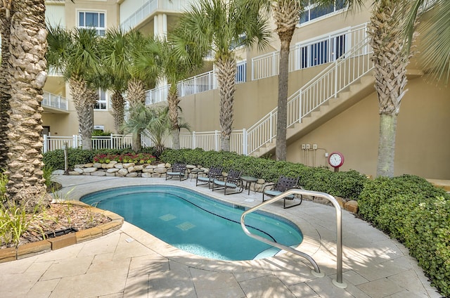 219 Scenic Gulf Dr Unit 930, Miramar Beach, FL 32550 - community pool featuring a patio area