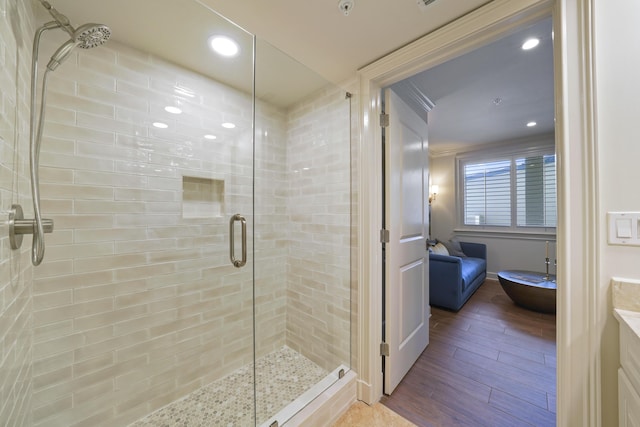 219 Scenic Gulf Dr Unit 930, Miramar Beach, FL 32550 - full bath featuring ensuite bath, a stall shower, wood finished floors, and recessed lighting