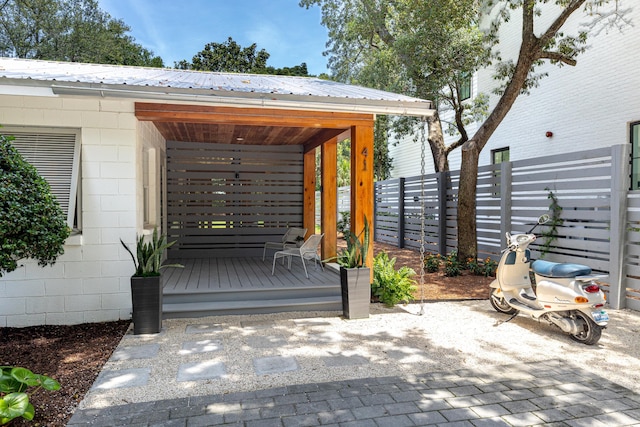 41 E Grove Ave, Santa Rosa Beach, FL 32459 - entrance to property with concrete block siding and a metal roof