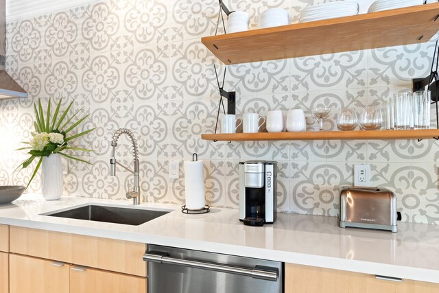 41 E Grove Ave, Santa Rosa Beach, FL 32459 - kitchen featuring stainless steel dishwasher, light countertops, open shelves, and tasteful backsplash