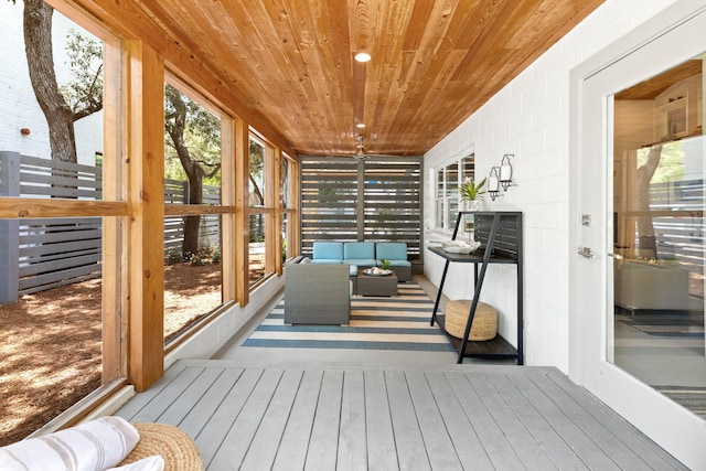 41 E Grove Ave, Santa Rosa Beach, FL 32459 - sunroom featuring outdoor lounge area