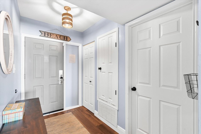 780 Sundial Ct Unit 2001, Fort Walton Beach, FL 32548 - foyer with dark wood-style flooring and baseboards