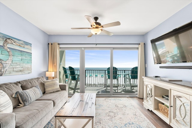 780 Sundial Ct Unit 2001, Fort Walton Beach, FL 32548 - living area with a ceiling fan, dark wood-type flooring, and a water view