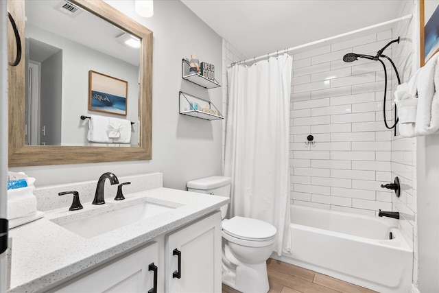 780 Sundial Ct Unit 2001, Fort Walton Beach, FL 32548 - full bathroom featuring vanity, wood finished floors, and shower / tub combo