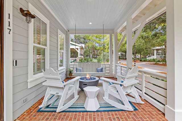 117 W Okeechobee, Santa Rosa Beach, FL 32459 - porch with an outdoor fire pit
