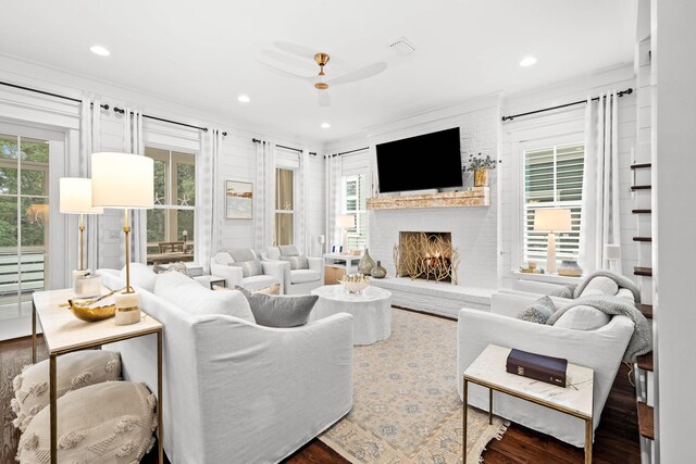 117 W Okeechobee, Santa Rosa Beach, FL 32459 - living room featuring a brick fireplace, wood finished floors, healthy amount of natural light, ceiling fan, and recessed lighting
