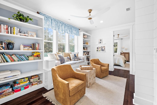 117 W Okeechobee, Santa Rosa Beach, FL 32459 - living area featuring ceiling fan, wood finished floors, and ornamental molding