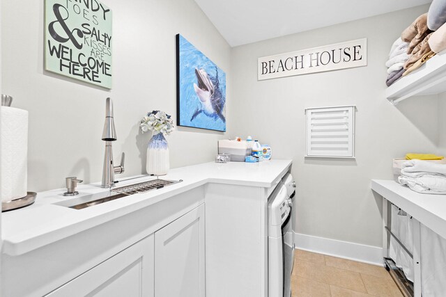 117 W Okeechobee, Santa Rosa Beach, FL 32459 - washroom featuring washing machine and dryer and light tile patterned floors