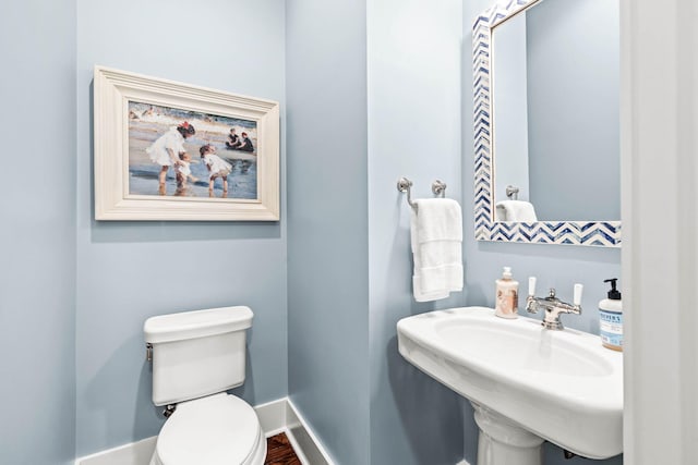117 W Okeechobee, Santa Rosa Beach, FL 32459 - half bathroom with toilet and baseboards