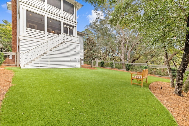 117 W Okeechobee, Santa Rosa Beach, FL 32459 - view of yard featuring stairway and a sunroom