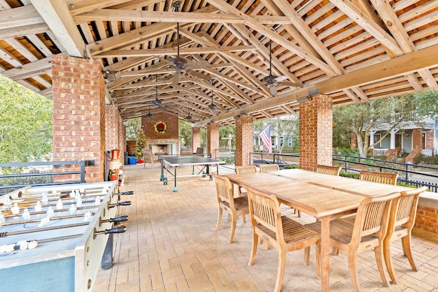 117 W Okeechobee, Santa Rosa Beach, FL 32459 - view of patio / terrace with an outdoor fireplace and outdoor dining space