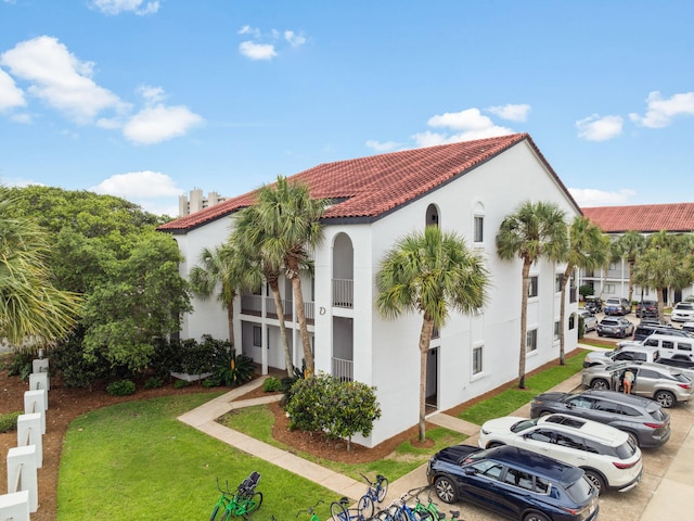 3604 E County Highway 30a Unit D5, Santa Rosa Beach, FL 32459 - view of building exterior with uncovered parking