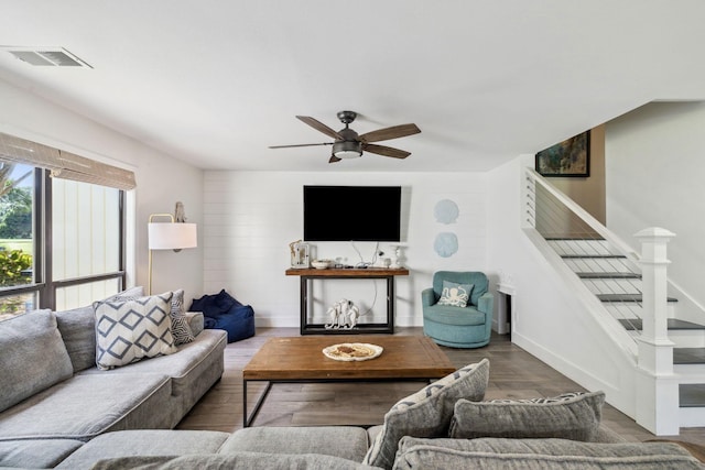736 Sandpiper Pl Unit 10525, Miramar Beach, FL 32550 - living room featuring stairway, ceiling fan, and wood finished floors