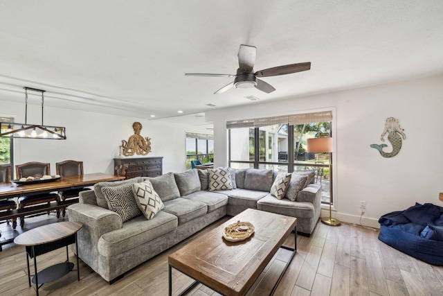 736 Sandpiper Pl Unit 10525, Miramar Beach, FL 32550 - living room featuring ceiling fan, light wood-style flooring, a chandelier, and recessed lighting