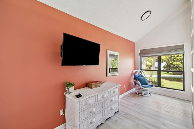 736 Sandpiper Pl Unit 10525, Miramar Beach, FL 32550 - living area featuring light wood-type flooring and high vaulted ceiling