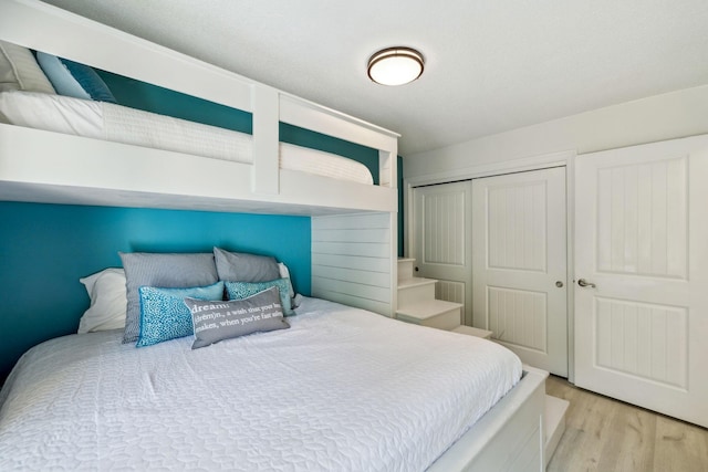 736 Sandpiper Pl Unit 10525, Miramar Beach, FL 32550 - bedroom with wood finished floors and a closet