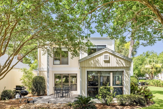 736 Sandpiper Pl Unit 10525, Miramar Beach, FL 32550 - back of house featuring a patio area
