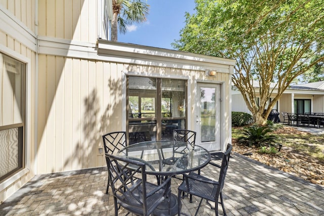736 Sandpiper Pl Unit 10525, Miramar Beach, FL 32550 - view of patio / terrace featuring outdoor dining area and french doors