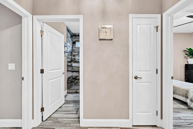 1369 N Beal Ext, Fort Walton Beach, FL 32547 - hall featuring light wood finished floors and baseboards