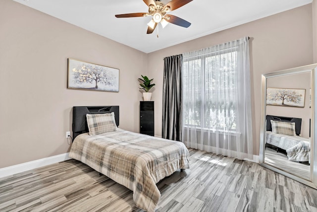 1369 N Beal Ext, Fort Walton Beach, FL 32547 - bedroom featuring light wood finished floors and a ceiling fan