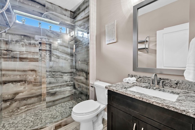 1369 N Beal Ext, Fort Walton Beach, FL 32547 - bathroom with a stall shower, vanity, and wood finished floors