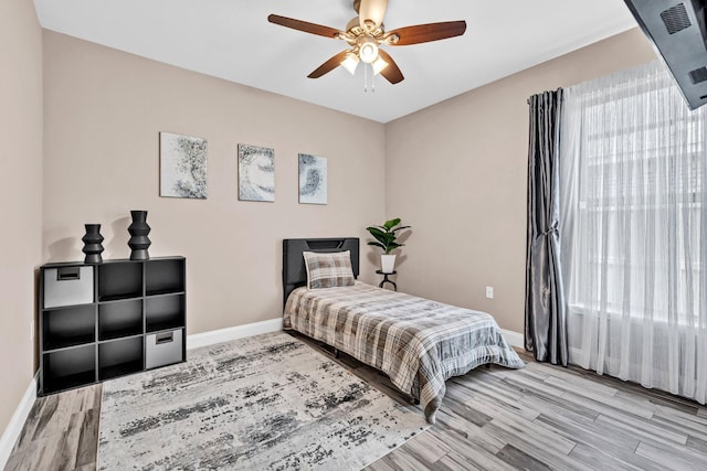 1369 N Beal Ext, Fort Walton Beach, FL 32547 - bedroom featuring light wood-style flooring and a ceiling fan