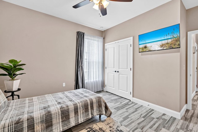 1369 N Beal Ext, Fort Walton Beach, FL 32547 - bedroom with light wood-type flooring, a closet, and ceiling fan