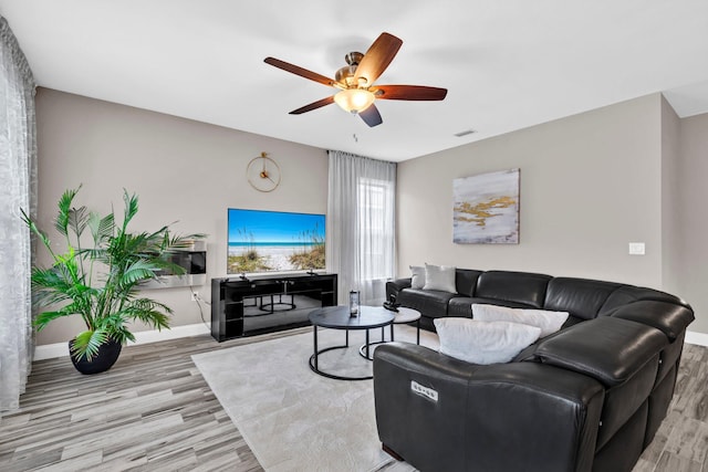 1369 N Beal Ext, Fort Walton Beach, FL 32547 - living room featuring wood finished floors and ceiling fan