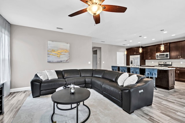1369 N Beal Ext, Fort Walton Beach, FL 32547 - living area featuring light wood-style flooring, ceiling fan, and recessed lighting